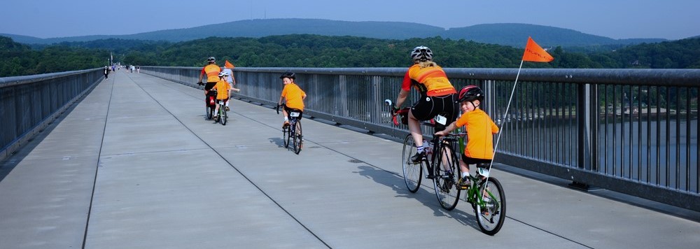orange_riders_cross_walkway_resized.jpg